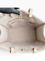 Load image into Gallery viewer, Louis Vuitton LV OnTheGo MM Tote Empreinte Leather Beige/Cream
