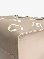 Load image into Gallery viewer, Louis Vuitton LV OnTheGo MM Tote Empreinte Leather Beige/Cream

