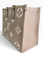 Load image into Gallery viewer, Louis Vuitton LV OnTheGo MM Tote Empreinte Leather Beige/Cream
