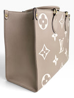 Load image into Gallery viewer, Louis Vuitton LV OnTheGo MM Tote Empreinte Leather Beige/Cream
