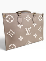 Load image into Gallery viewer, Louis Vuitton LV OnTheGo MM Tote Empreinte Leather Beige/Cream
