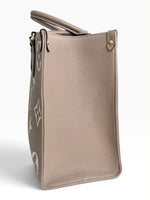 Load image into Gallery viewer, Louis Vuitton LV OnTheGo MM Tote Empreinte Leather Beige/Cream
