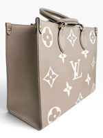 Load image into Gallery viewer, Louis Vuitton LV OnTheGo MM Tote Empreinte Leather Beige/Cream
