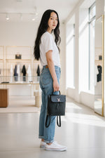 Load image into Gallery viewer, Louis Vuitton Lockme BB Backpack, Black Grained Calfskin, Silver-tone Hardware
