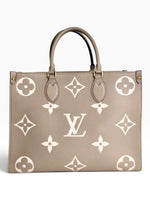 Load image into Gallery viewer, Louis Vuitton LV OnTheGo MM Tote Empreinte Leather Beige/Cream
