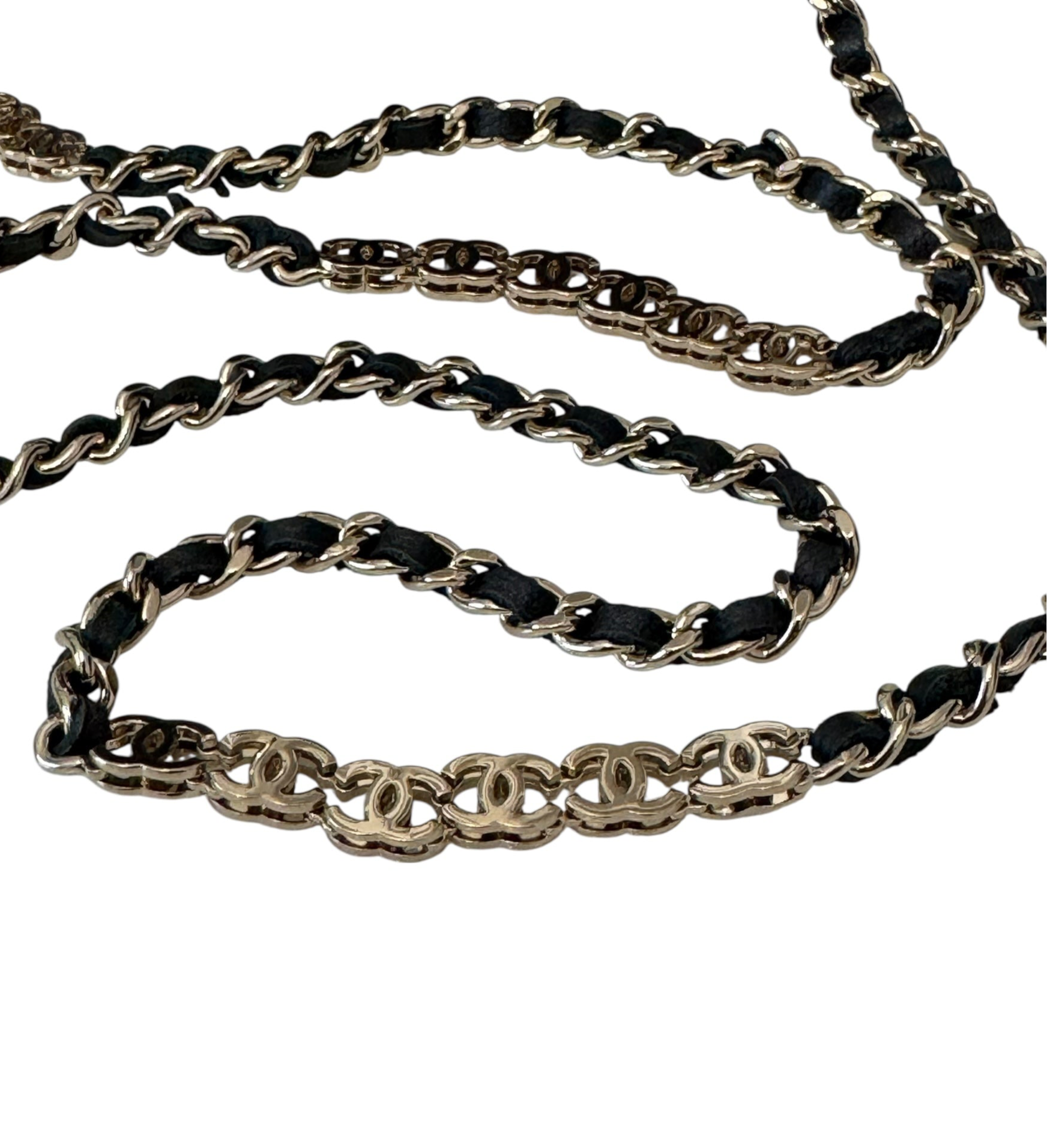 Gold and black chain belt on a white background