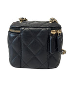将图片加载到图库查看器，Black quilted handbag with gold accents on a white background
