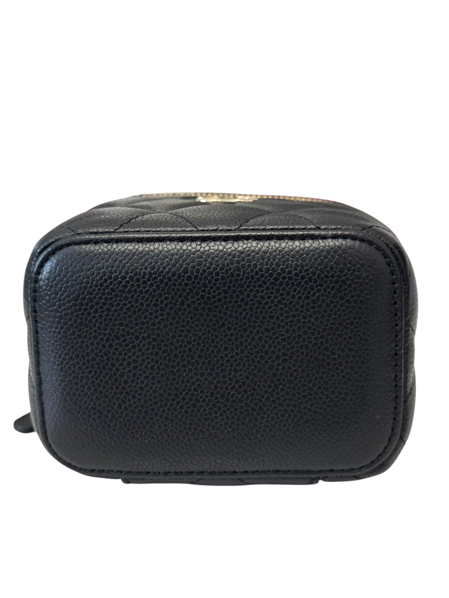 Black quilted leather pouch on a white background