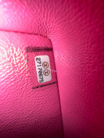 将图片加载到图库查看器，Close-up of a pink product with a label on a textured surface
