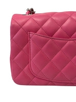 将图片加载到图库查看器，Pink quilted handbag on a white background

