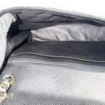 将图片加载到图库查看器，Close-up of a gray handbag with &#39;Chanel&#39; branding, showing the interior and texture.

