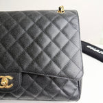 将图片加载到图库查看器，Gray quilted handbag with gold hardware on a white background
