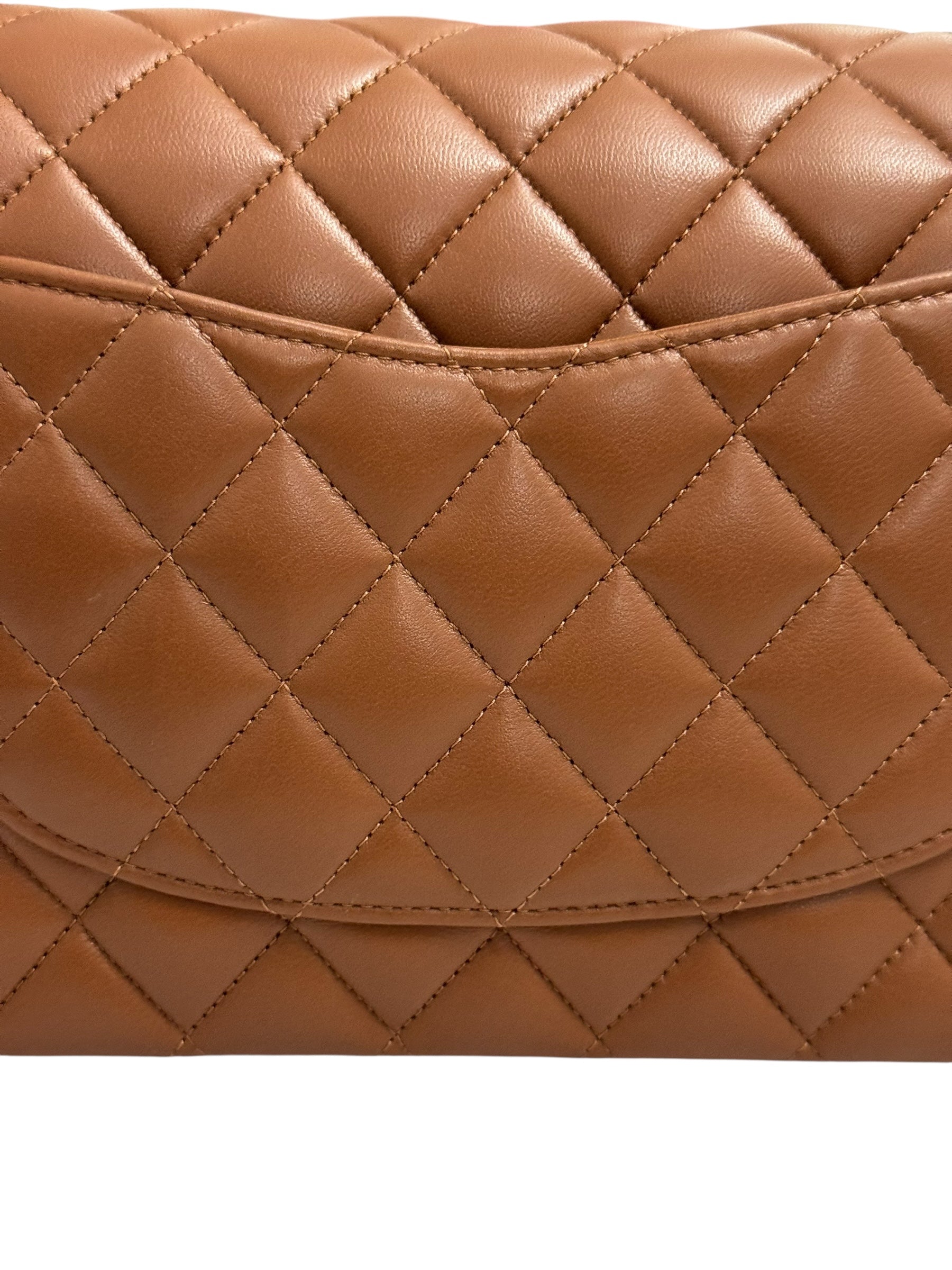 Close-up of a brown quilted handbag