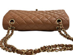 将图片加载到图库查看器，Brown quilted handbag with gold chain strap on a white background
