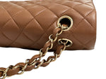 将图片加载到图库查看器，Brown quilted handbag with gold chain strap on a white background
