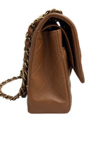 将图片加载到图库查看器，Brown quilted handbag with a chain strap on a white background
