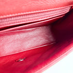 将图片加载到图库查看器，Close-up of a red leather wallet with a white background

