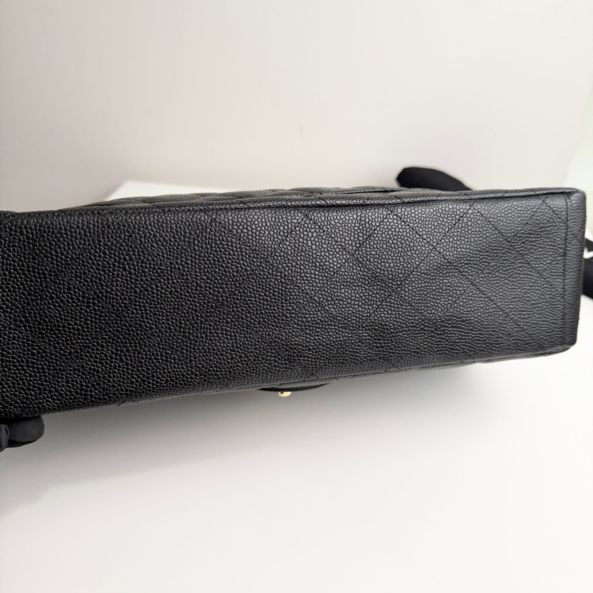 Louis_Vuitton_ handbag on a white background