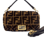 将图片加载到图库查看器，Designer handbag with a prominent logo pattern on a white background
