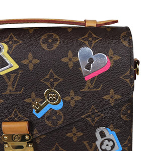 Pochette Metis Monogram Love Lock GHW