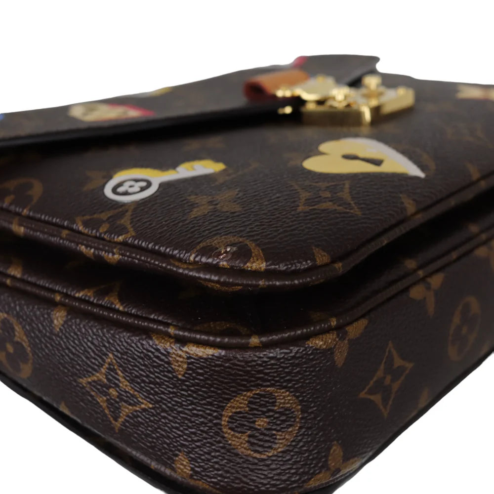 Pochette Metis Monogram Love Lock GHW