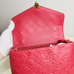 Load image into Gallery viewer, Red handbag with a brand logo on a white background
