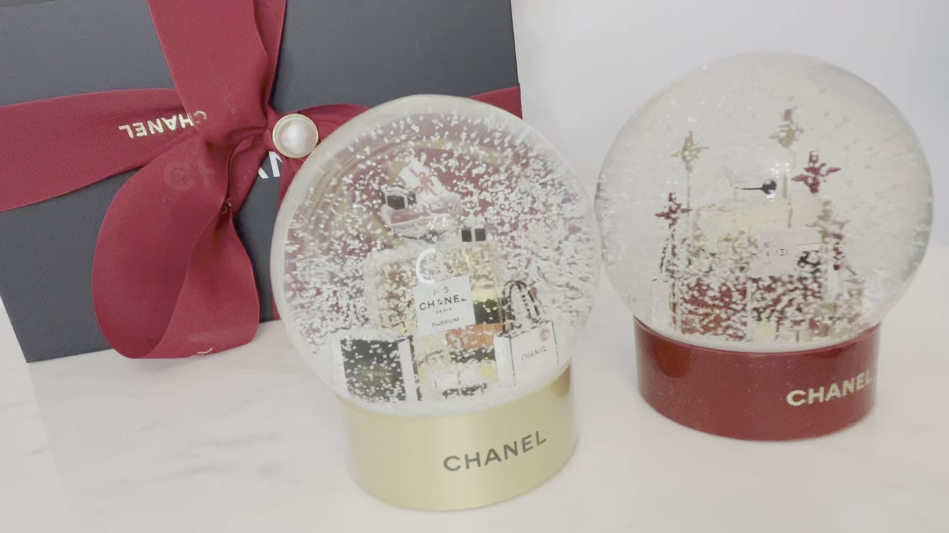 Chanel Holiday Snow Globes