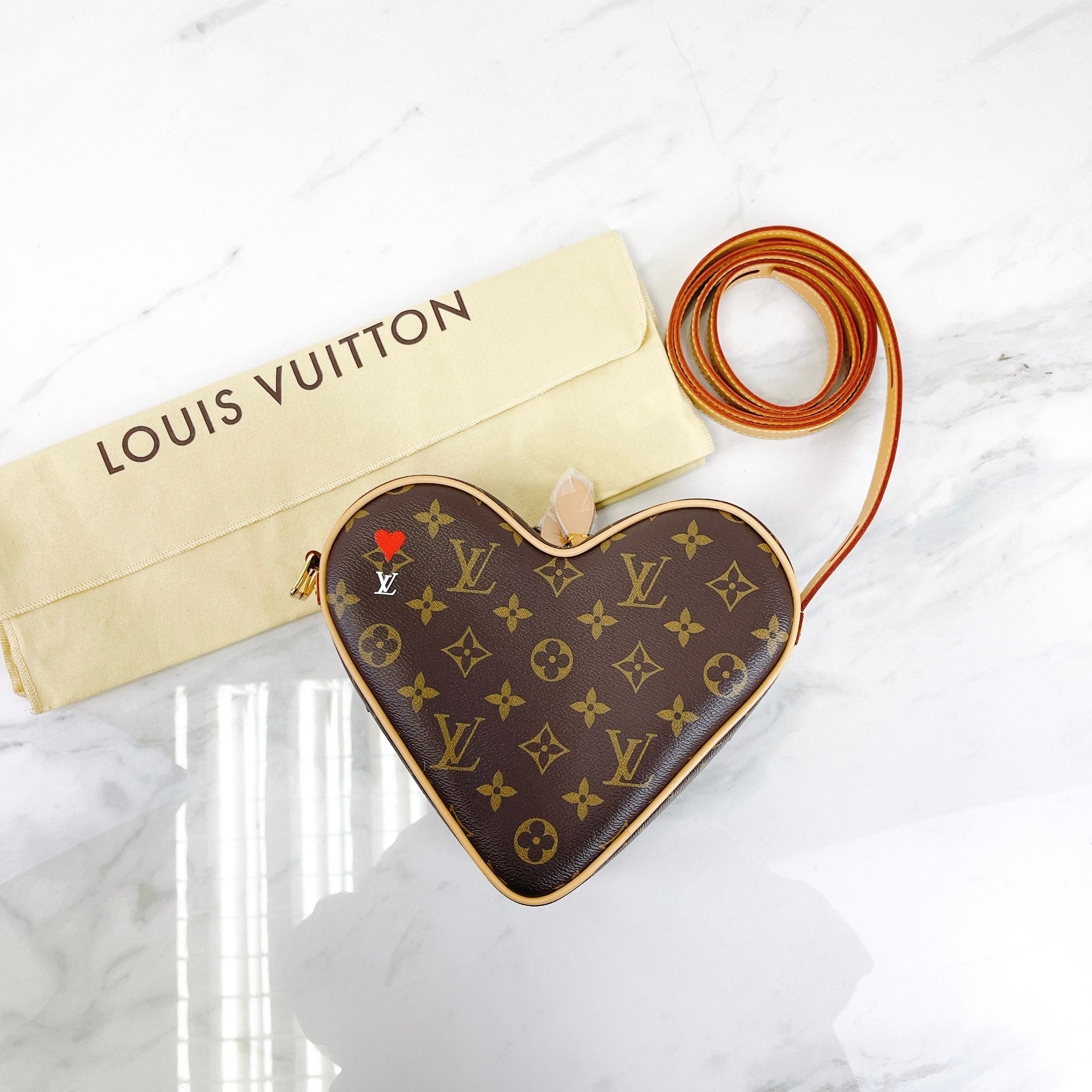 What fits in my LV heart bag 🥰 #lv #lvheartbag #lvlover #louisvuitto