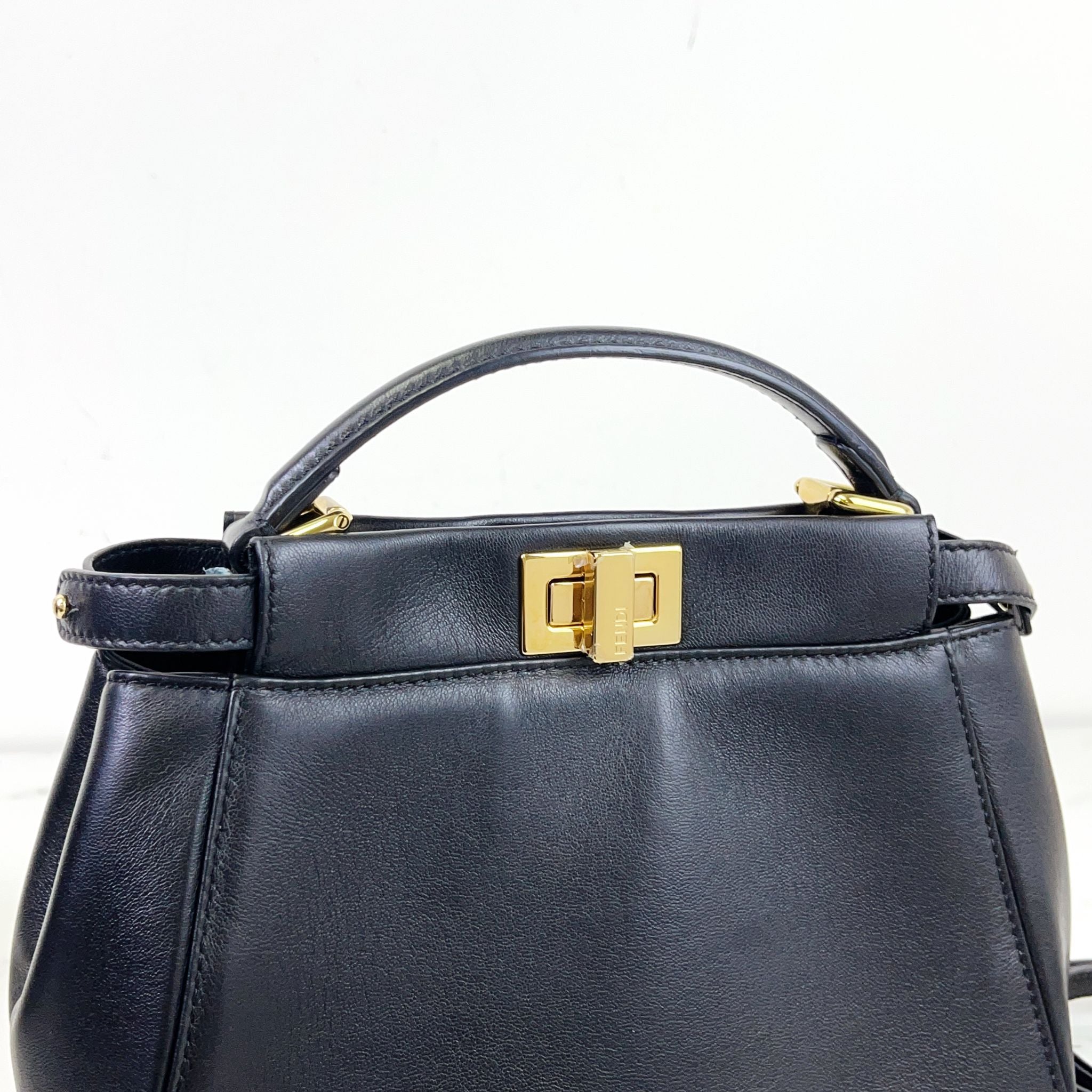 FENDI PEEKABOO MINI 与 DEFENDER